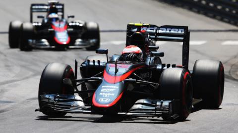 Fernando Alonso and Jenson Button in action for Mclaren