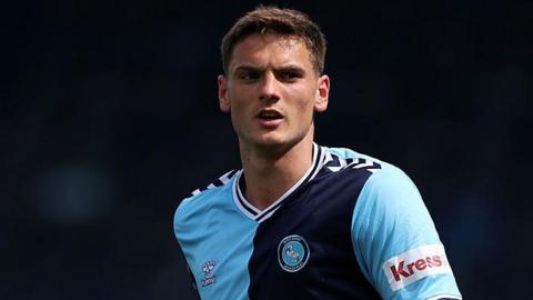 Caleb Taylor in action for Wycombe