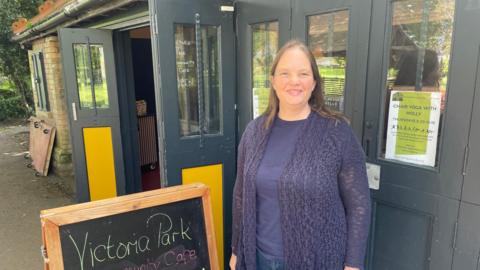 Sam Evans in front of the community cafe in Frome