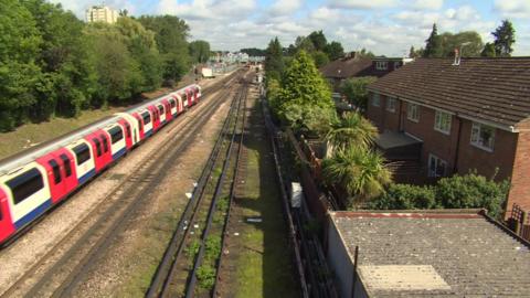 A Tube passes homes