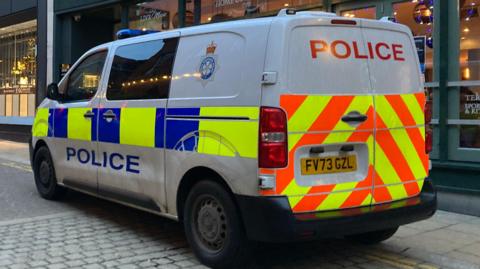 A police van on a street in York. 