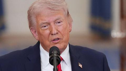 U.S. President Donald Trump speaks from the Cross Hall of the White House on April 1, 2026 i