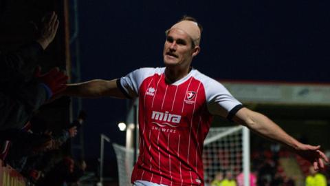 Charlie Raglan celebrates a Cheltenham goal