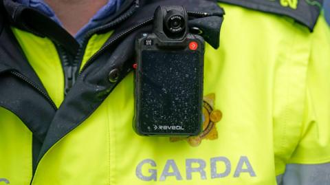 Garda officer in yellow jacket