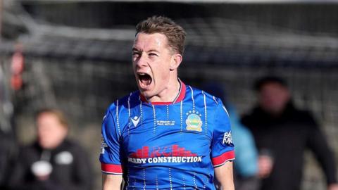Kyle McClean celebrates