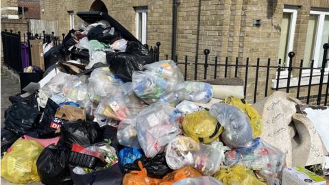 Rubbish piled in Stepney Green