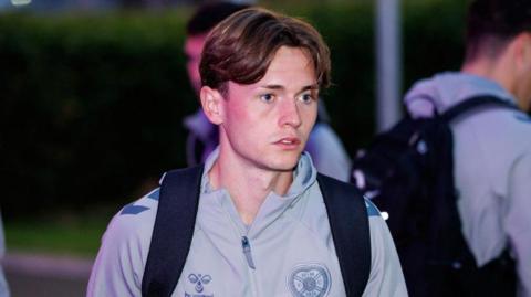 Hearts' James Penrice leaves Edinburgh Airport