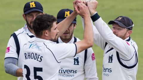 Warwickshire celebrate a wicket