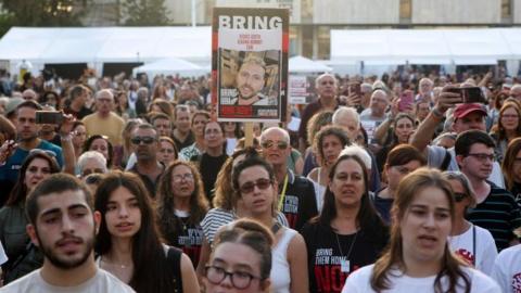People gathered as they awaited news of hostages expected to be released by Hamas, amid a hostages-prisoners swap deal between Hamas and Israel, in Tel Aviv, Israel, November 24, 2023.