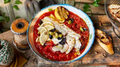 Marcus Wareing’s solo fish supper sees steamed cod served on top of a quick chilli tomato sauce, with plenty of olives and crusty bread for company