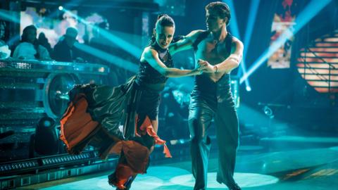 Amber Davies and Nikita Kuzmin perform the Paso Doble on Strictly Come Dancing, week 8. Credit: BBC/Guy Levy