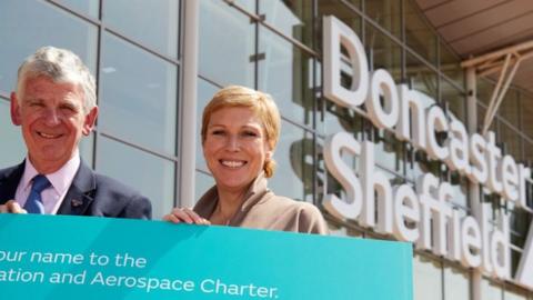 Robert Hough of Doncaster Sheffield Airport and Aviation Minister Baroness Charlotte Vere