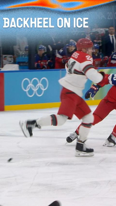 Denmark's Nikolaj Ehlers kicks the puck back with his heel