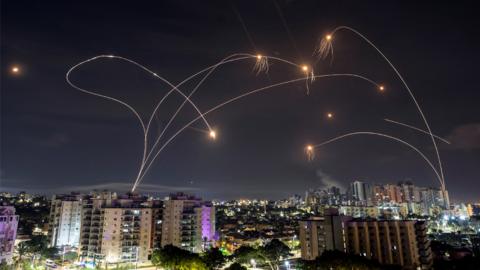 Israel's Iron Dome anti-missile system intercepts rockets launched from the Gaza Strip