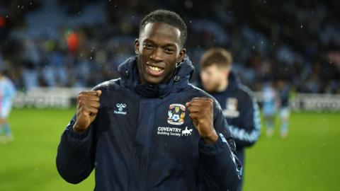 Romain Esse celebrates Coventry's victory over Millwall