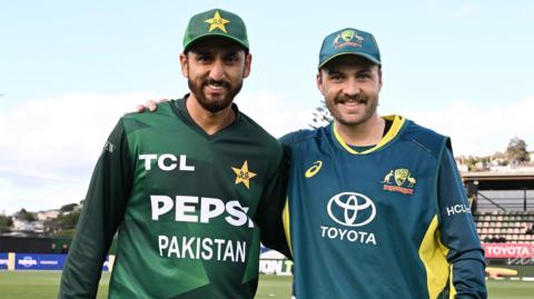 Pakistan's Salman Ali Agha and Australia's Josh Inglis before a Twenty20 international in 2024