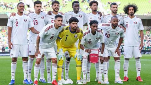 Qatar football team posing for team picture