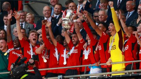 Manchester United lift FA Cup trophy