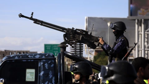 A Houthi soldier mans a machine gun on a pickup truck while on patrol during a rally in solidarity with Iran in Sanaa, Yemen, 27 March 2026