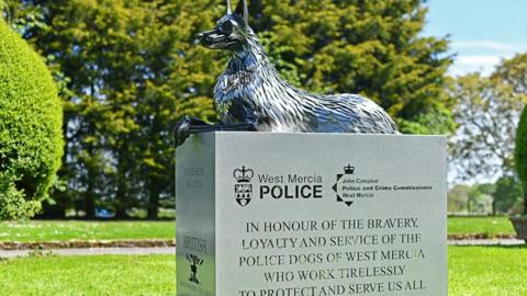 The police dog sculpture on a plinth