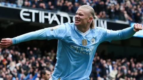 Manchester City striker Erling Haaland celebrates scoring against Everton