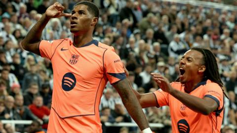Marcus Rashford celebrates after heading Barcelona in front at Newcastle United in the Champions League.