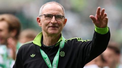 Martin O'Neill smiles after winning the Scottish Premiership