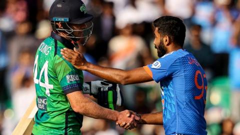 Ireland's Craig Young shakes hands with India's Jasprit Bumrah