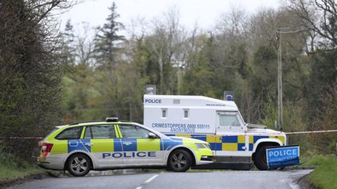 Police vehicles at a cordon near the scene of the attempted attack outside Dungiven