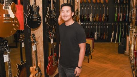 BandLab CEO Menf Ru Kuok in a Swee Lee music shop.