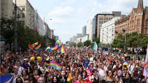 People take part in an annual LGBTQ+ Equality Parade in Warsaw