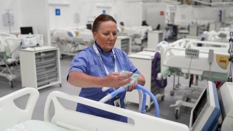 A nurse in one of the hospital's wards