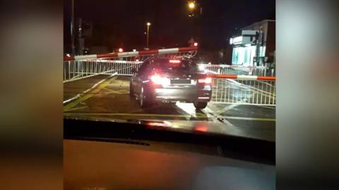 Car drives through barriers