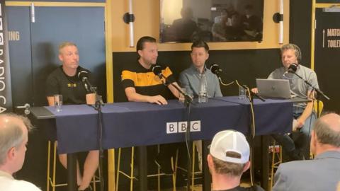 Cambridge United's director of football speaking at a fans' forum