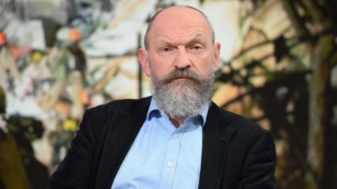 Chris O'Shea, chief executive of Centrica which owns British Gas, faces the camera wearing a dark suit jacket and light blue shirt