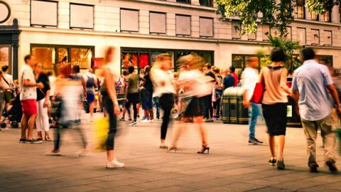 Shoppers on a busy high street