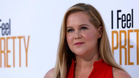 Cast member Amy Schumer poses at the premiere of "I Feel Pretty" in Los Angeles, 17 April 2018