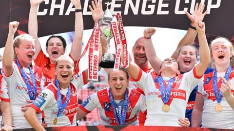 St Helens parade the Challenge Cup at Wembley after their win over Leeds