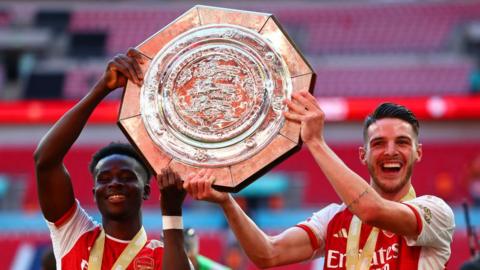 Arsenal celebrate winning the Community Shield