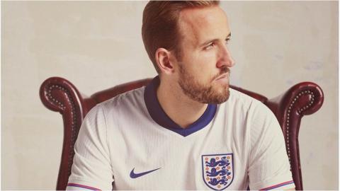 Harry Kane in new England home kit.