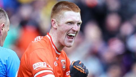 Ciaran Mackin celebrates scoring Armagh's third goal against Down