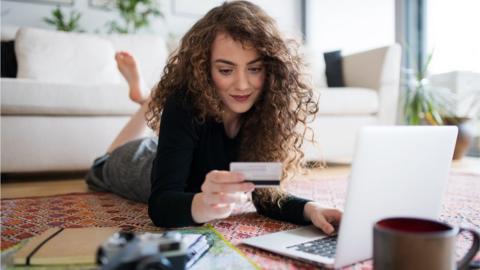 A woman buying something online