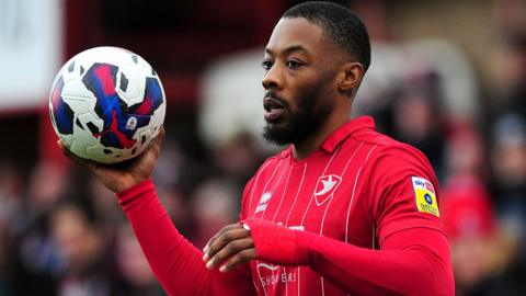 Ryan Jackson in action for Cheltenham Town