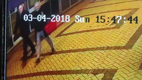 CCTV footage shows a man and woman walking near the bench where Sergei and Yulia Skripal were found