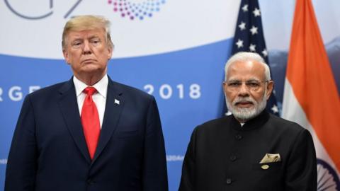 India's Prime Minister Narendra Modi (R) and US President Donald Trump