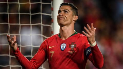 Cristiano Ronaldo gestures during Portugal's game with Serbia