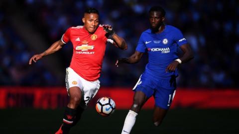 Antonio Valencia of Manchester United is challenged by Tiemoue Bakayoko of Chelsea during The Emirates FA Cup Final