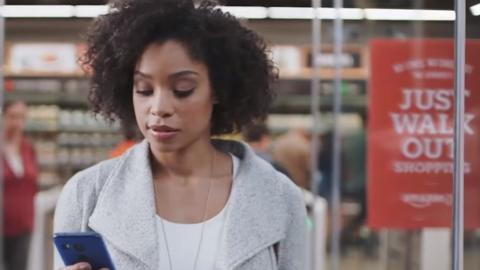 Amazon Go user outside shop