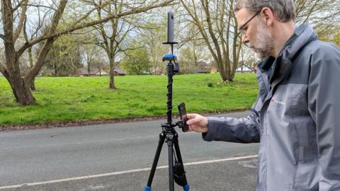 Volunteer Jim Gayes filming in Rhayader