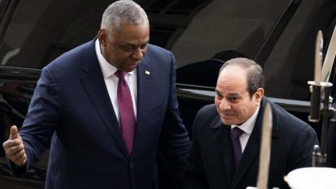 US Secretary of Defense Lloyd Austin greets Egyptian President Abdel Fattah El-Sisi